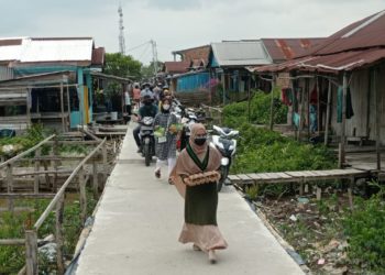 Peringati Hari Perempuan Sedunia, Kohati Tanjabbarat Bagi- Bagi Sembako