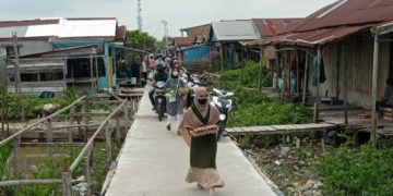 Peringati Hari Perempuan Sedunia, Kohati Tanjabbarat Bagi- Bagi Sembako