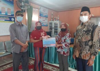 Pemdes Desa Tanjung Karang Tanah Kampung Kembali Salurkan Bantuan Langsung Tunai untuk Warga Terdampak Covid-19