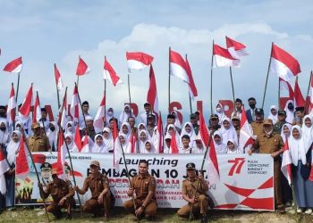 Bupati Kerinci Adirozal Hadiri Launching Program Pembagian 10 Juta Bendera Merah Putih