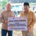 Bupati Tanjab Barat Serahkan Bantuan Bibit Jambu dan Lampu Tenaga Surya dari Petrochina untuk 3 Desa