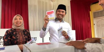 Gunakan Hak Pilih, Edi Purwanto Kagum Animo Masyarakat Tinggi Meski Hujan