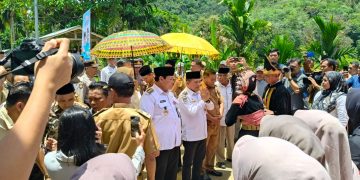 Jalan Batang Asai Mulus di Kepimpinan Gubernur Al Haris, Warga Batang Asai Gelar Syukuran