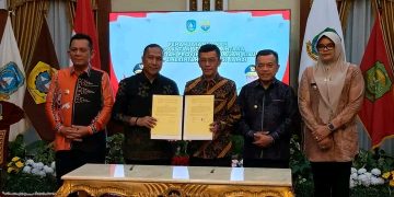 Sinergi Pariwisata dan Ekonomi Lintas Sumatera, Jambi – Kepri Tandatangani Kerjasama Pengelolaan Pulau Berhala 